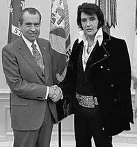 220px-Nixon_Elvis_December_21_1970_Meeting_Cropped.webp
