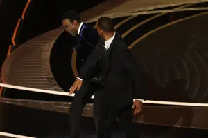 chris-rock-and-will-smith-are-seen-onstage-during-the-94th-news-photo-1648435250.webp