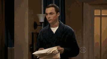 sheldon-cooper-throw-papers.gif