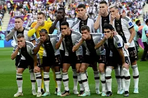germany-side-cover-their-mouths-they-pose-team-picture-ahead-qatar-2022-world-cup-match.webp