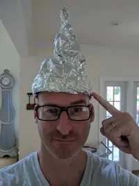 1200px-Manwithtinfoilhat.webp