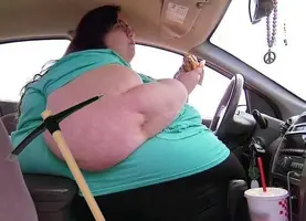 ssbbw_eating_while_filling_up_the_car_with_her_fat_by_themagus717_ddwvdlg-fullview.webp