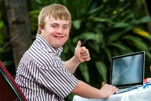 depositphotos_62329839-stock-photo-handicapped-student-working-on-laptop.webp