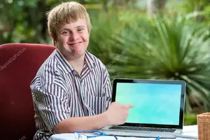 depositphotos_62329905-stock-photo-friendly-boy-with-down-syndrome.webp