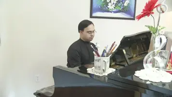 WNY_musician_with_down_syndrome_inspires.jpg WNY_musician_with_down_syndrome_inspires.jpg