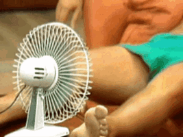 man-using-small-electric-fan-3gnr8lumfe5k5jg1.gif