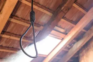 depositphotos_443444096-stock-photo-noose-hanging-his-neck-suicide.webp