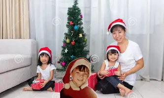 asian-chinese-mother-daughters-sitting-next-to-christmas-tre-tree-celebrate-new-year-82502265.webp