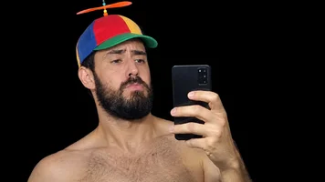 Pouty Selfie in a Colorful Propeller Beanie.webp