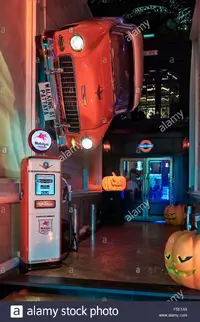unusual-feature-display-of-a-vintage-car-and-petrol-filling-pump-at-F5E1A5.webp