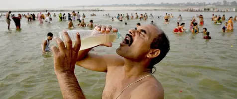Ganges_Drinking_Holy_River_Water_Hindus.webp